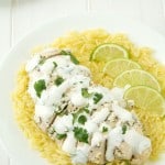 A mouthwatering baked cilantro-lime sour cream chicken recipe that is super-moist and so flavorful! We love it!