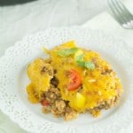 A delicious cheesy beefy rice casserole that is perfect for a busy weeknight meal! Everyone will be satisfied!