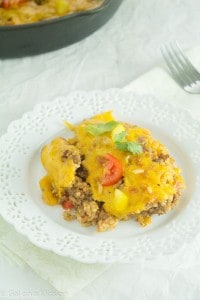 A delicious cheesy beefy rice casserole that is perfect for a busy weeknight meal! Everyone will be satisfied!