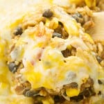 A delicious cheesy enchilada rice skillet casserole recipe, perfect for an easy weeknight meal. Ready under 20 minutes!