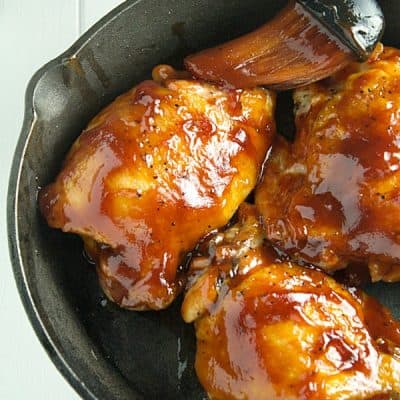 The juiciest and most flavorful baked bbq chicken thighs recipe!