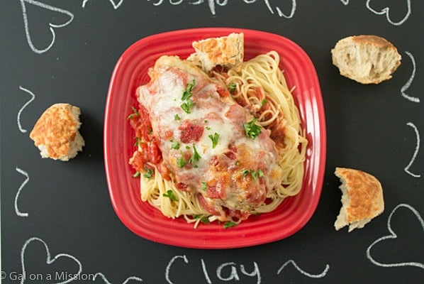 Easy Chicken Parmesan: Moist and juicy chicken breasts coasted in breadcrumbs, mixed with Italian seasonings; then topped with diced tomatoes, Parmesan cheese, and fresh mozzarella.