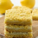 Lemon cream cheese bars: Decadent lemon whipped cream cheese baked between layers of a special ingredient with a delicious streusel lemon topping. A simple and quick dessert bar recipe!