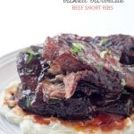 Baked Barbecue Beef Short Ribs - Drool-worthy, finger-licking, and mouthwatering beef short ribs! Baked in a spice rub, then slathered with barbecue sauce! Bring the fancy home!