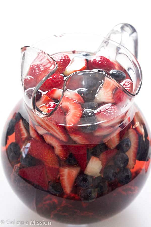 With the warmer weather, we all want a glass of sangria, especially with mixed berries! This really is one of the easiest sangria recipes out there. You can also call it a sangria white because it utilizes white wine, or even a sangria punch when different wines are mixed together! You are going to love it, I promise.