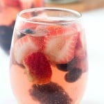 With the warmer weather, we all want a glass of sangria, especially with mixed berries! This really is one of the easiest sangria recipes out there. You can also call it a sangria white because it utilizes white wine, or even a sangria punch when different wines are mixed together! You are going to love it, I promise.