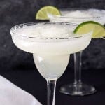 Frozen Lime Margaritas - A perfect way to celebrate the weekend with your friends and family! Refreshing and absolutely delicious. Skip the store-bought mixes and make your own!