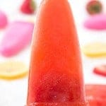 Strawberry Lemonade Ice Pops - An absolutely must-have for those hot summer days! Made with fresh strawberries and freshly squeezed lemons!