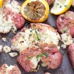 Smashed Herb Lemon Baked Potatoes - Crispy on the outside, moist and tender on the inside! Each bite contains just a hint of freshly squeezed lemon and herbs!