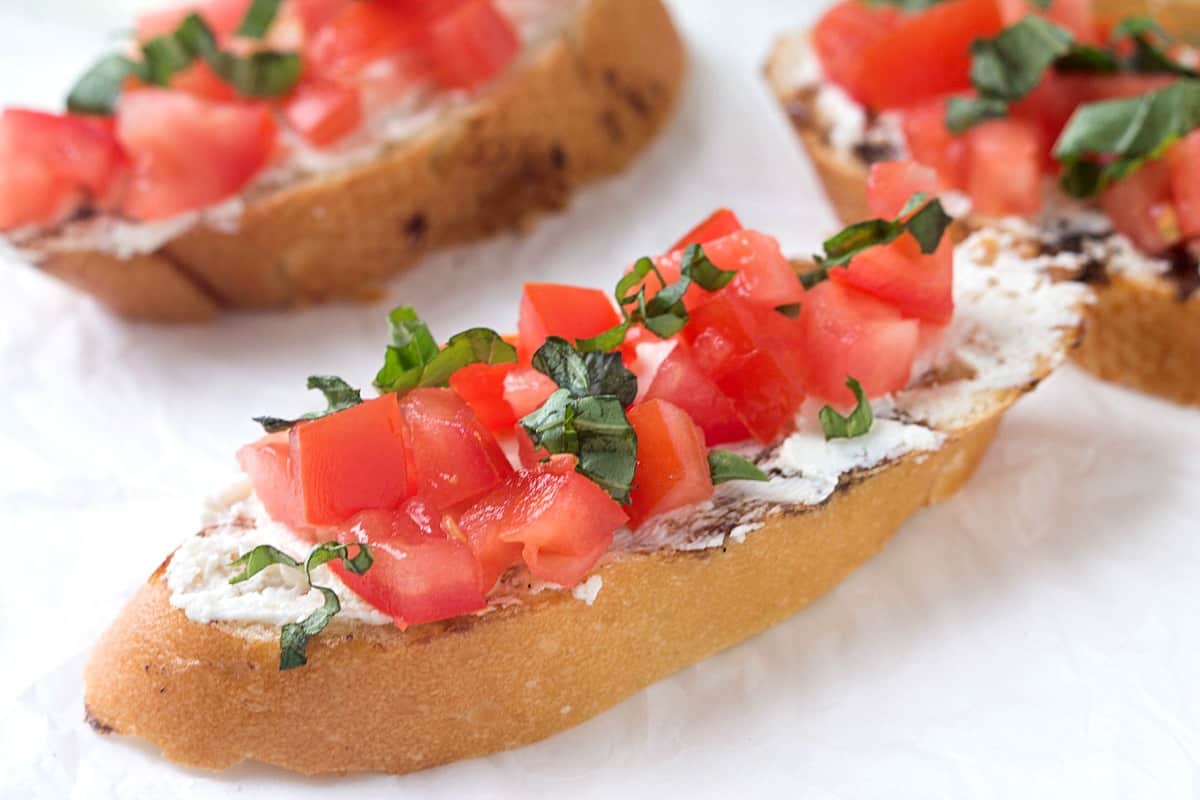 Tomato and Basil Crostini with Whipped Feta Gal on a Mission