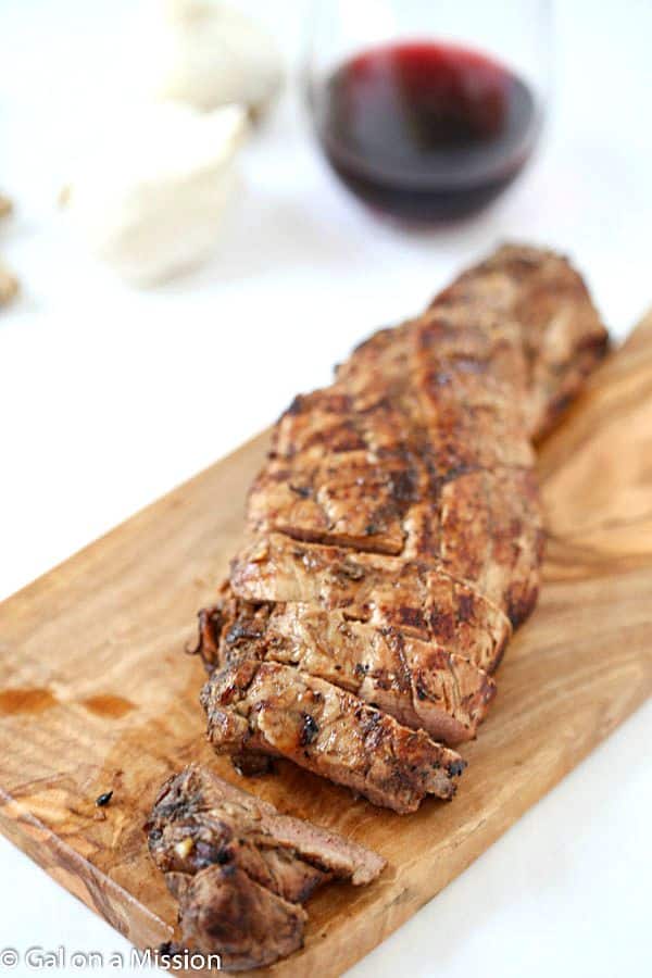 Grilled Ginger Pork Tenderloin - Tender, moist and oh, so juicy! Marinated in an out-of-this-world marinade!