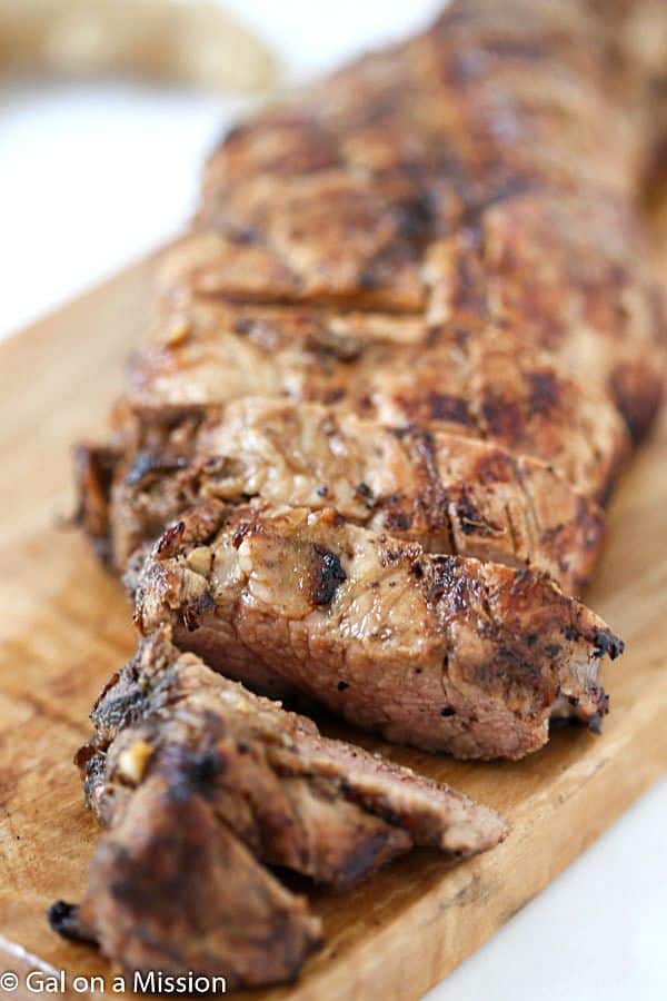 Grilled Ginger Pork Tenderloin - Tender, moist and oh, so juicy! Marinated in an out-of-this-world marinade!
