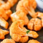 Healthy Buffalo Cauliflower Bites - These bites are addicting, spicy (to some), and surprisingly fantastic! Grab your favorite dip and let's dip in!