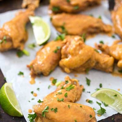 Crispy Baked Chicken Wings with Peanut Sauce - Crispy, crunchy exterior and tender interior. Topped with an out-of-this-world peanut sauce!