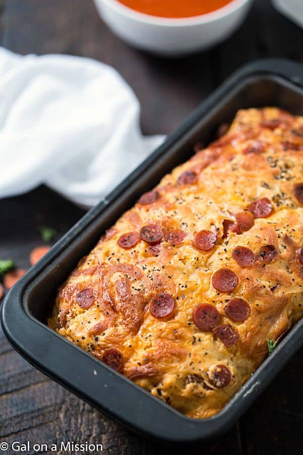 Pepperoni Pizza Quick Bread Recipe - An American favorite stuffed into moist, tender, and flavorful pepperoni pizza quick bread! Ready in no time. Grab the marinara sauce! Move on over pepperoni rolls!