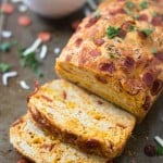 Pepperoni Pizza Quick Bread - Moist and flavored with cheddar cheese and mini pepperonis! Don't forget the marinara sauce!