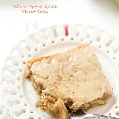 Warm Apple Spice Sheet Cake with Sweet Caramel Glaze - Each bite contains the perfect amount of shredded apples with a hint of nutmeg and cloves! Best when served warm.