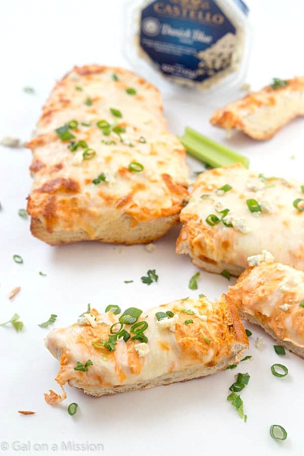 Buffalo Chicken French Bread Recipe - Crunchy, creamy, and a little spicy! Perfect as an appetizer or as a main dish! Better than buffalo dip! Add this recipe to your collection of french bread ideas!
