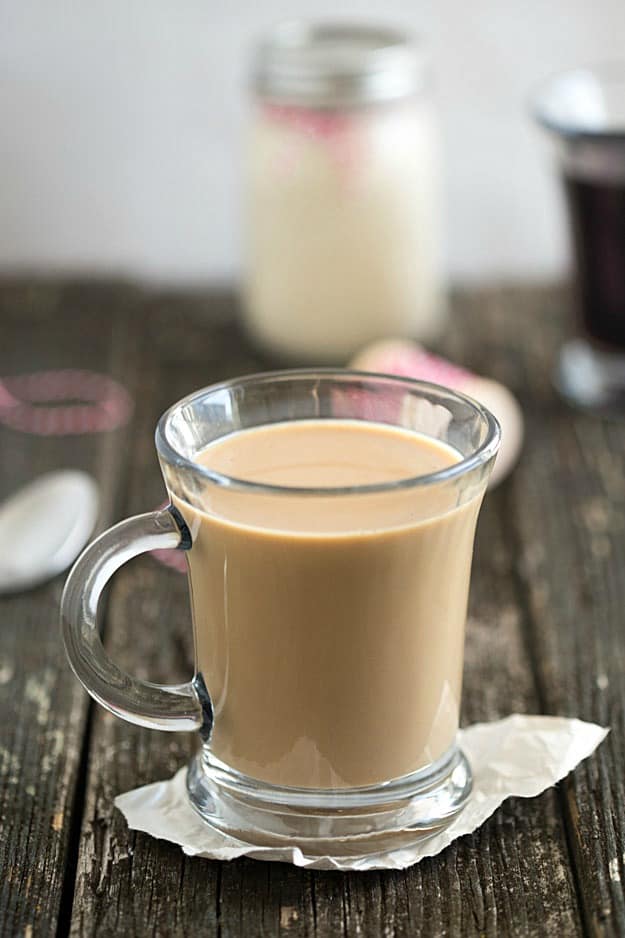 Homemade Eggnog Coffee Creamer - Incredibly easy with only three ingredients. Great for homemade gifts! Enjoy a piece of eggnog cheesecake or even an eggnog cookie on the side!