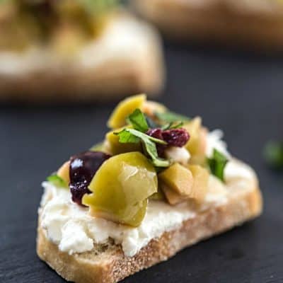 Mixed Olive and Whipped Feta Crostini - An incredibly easy appetizer that will wow your party guests!