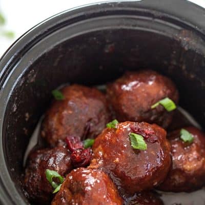 Slow Cooker Cranberry Meatballs - The perfect appetizer for the holidays! So good, they will be gone before you know it!