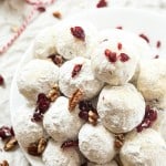 Snowball Cookies with Cranberries Recipe - They are so easy and perfect for Christmas! Made with pecans and dried cranberries. Skip the chocolate this year and make snowball cookies!