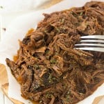 4-Ingredient Slow Cooker Dr. Pepper Pulled Pork - So easy with only five minutes or prep for the most delicious shredded pork! This recipe is ridiculously easy, the ultimate set and forget slow cooker recipe. The leftovers are perfect for tacos, sandwiches, nachos, to name a few of the obvious ones!