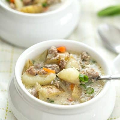 One-Pot Creamy Sausage and Potato Soup Recipe - So easy with hardly any prep, besides removing the casing from the sausage, with big flavor! Make it in the dutch oven or even in a crockpot. So creamy and not made with Velveeta!