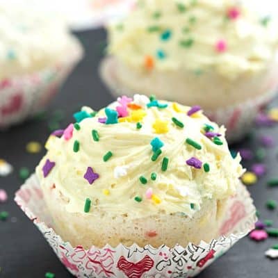 Easy 1-Minute Funfetti Mug Cupcake - Why bake a tray of cupcakes when you can make a mug cupcake in the microwave in only 1-minute? So easy and delicious when you make it with your loved one!