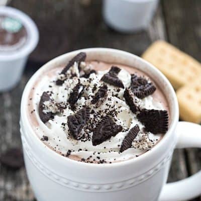 Easy Cookies 'n Cream Hot Chocolate Recipe - Ultra creamy and decadent! Made in only a few minutes and topped with whipped cream and chopped up chocolate cookies! Semi-homemade!