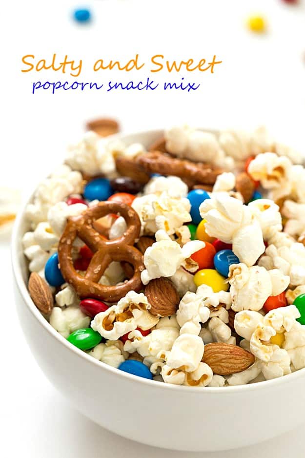 Salty and Sweet Popcorn Snack Mix - Crunchy, salty, sweet, and very addicting! Perfect for a DIY snack mix bar! Very versatile and you can add any toppings you would like.