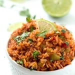 Slow Cooker Mexican Rice (Spanish Rice) - Have you ever wanted to know how easy it is to make restaurant-style Spanish rice at home? Now you can! It's so simple and easy and so much better than Knorr's packaged Spanish rice. This fool-proof recipe starts with the basic pantry ingredients and ends with fluffy, tender, sweet, and spicy rice!