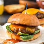 Carolina-Style Angus Beef Burger - Not your average burger! Juicy beef burgers are carefully seasoned with a tangy vinegar-based BBQ sauce and spices and finished with even more lip-smacking, finger-licking BBQ sauce!