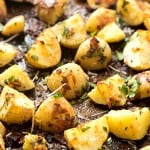 Garlic Parmesan Pan Roasted Potatoes - If you love crispy baked potatoes, you need to try these pan roasted potatoes! Crispy on the outside and moist and tender on the inside! The perfect side-dish to any meal you are making for dinner tonight!