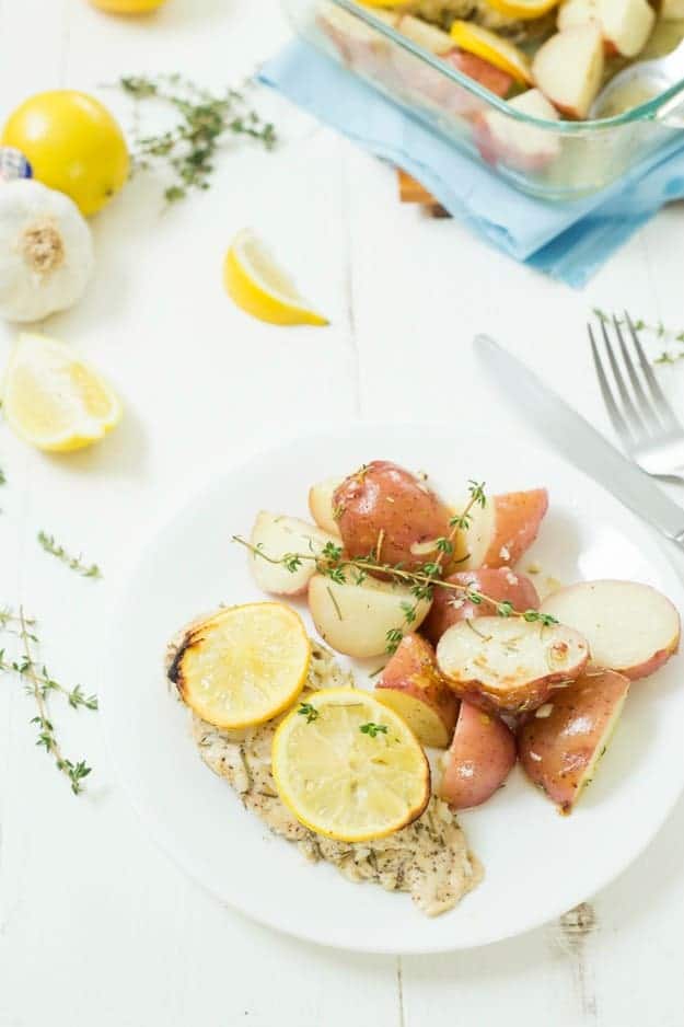 Baked Lemon Rosemary Chicken and Potatoes - So easy to make, baked in one dish, and bursting with lemony flavor! Roasted and baked in the oven to perfection. A winner every time and so healthy!