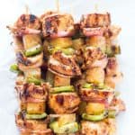 Easy Teriyaki Chicken & Pineapple Kabobs - Dinner cannot get any easier than these grilled kabobs! Packed with flavor from the marinade and threaded onto a skewer with pineapple chunks, red onions, and green bell peppers, then grilled to juicy perfection. By husband LOVED these!