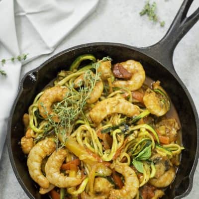 Italian Shrimp and Zucchini Noodles (Zoodles) - A delicious and healthy meal made with spiralized zucchini noodles, bell peppers, fresh spices, shrimp, and tossed with a thick and hearty pasta sauce! Super easy to make and perfect for a quick weeknight meal.