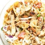 Asian Chicken Pasta Salad - Made with an incredible vinaigrette and simple ingredients! Ready to go in 15 minutes and can be made with or without mandarin oranges. Perfect for picnics and potlucks.