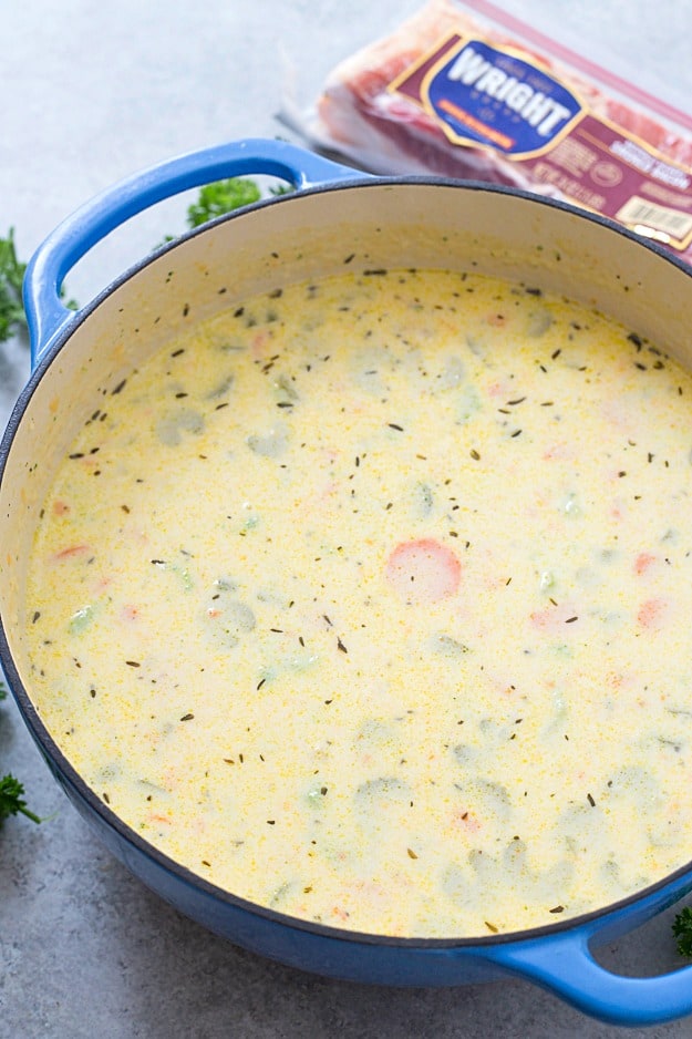 Creamy Broccoli Potato Soup - Dinner cannot get any easier! This soup is thick, creamy, flavorful, and loaded with broccoli, tender diced potatoes, and sharp cheddar cheese!