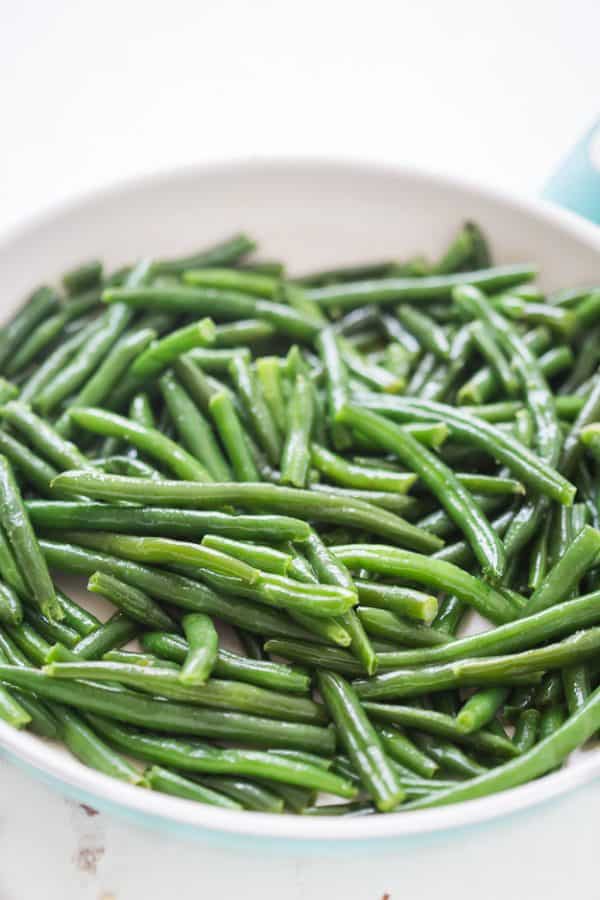 Lemon Butter Green Beans with Toasted Almonds Bacon & Feta Gal on a