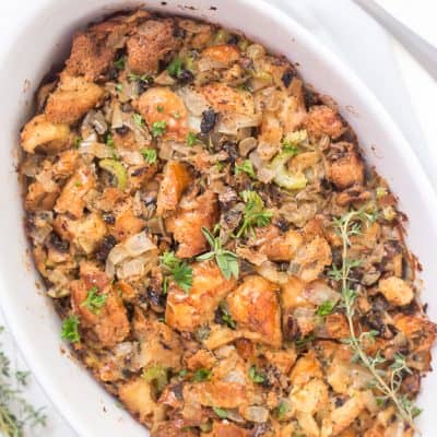 This Life-Changing Easy Thanksgiving Stuffing is my go-to stuffing recipe! Homemade stuffing is the best when made with fresh herbs, torn-apart bread, and mushrooms! A must-have this holiday!