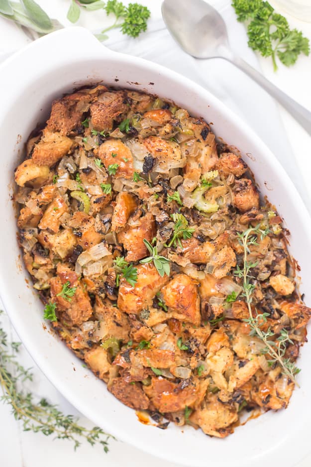 This Life-Changing Easy Thanksgiving Stuffing is my go-to stuffing recipe! Homemade stuffing is the best when made with fresh herbs, torn-apart bread, and mushrooms! A must-have this holiday!