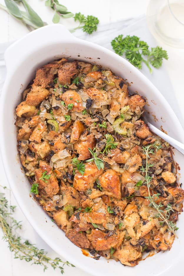 This Life-Changing Easy Thanksgiving Stuffing is my go-to stuffing recipe! Homemade stuffing is the best when made with fresh herbs, torn-apart bread, and mushrooms! A must-have this holiday!