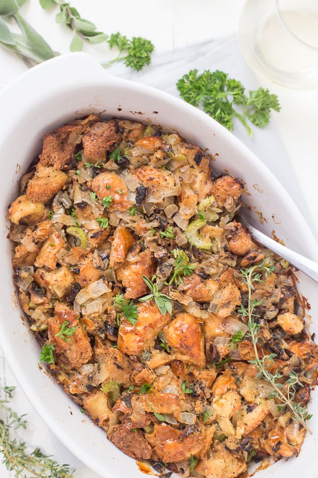 This Life-Changing Easy Thanksgiving Stuffing is my go-to stuffing recipe! Homemade stuffing is the best when made with fresh herbs, torn-apart bread, and mushrooms! A must-have this holiday!