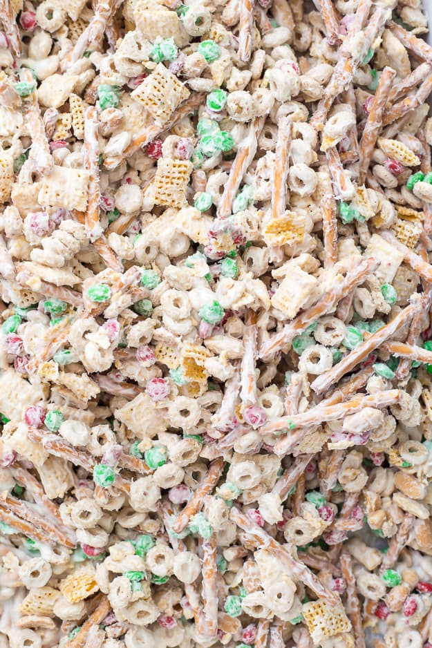 Christmas Crack Chex Mix is a family-favorite filled with Chex mix, cheerios, salted peanuts, M&M's, pretzels, and coated in chocolate! Beware because it's highly addictive and so good! Makes for delicious homemade gifts!