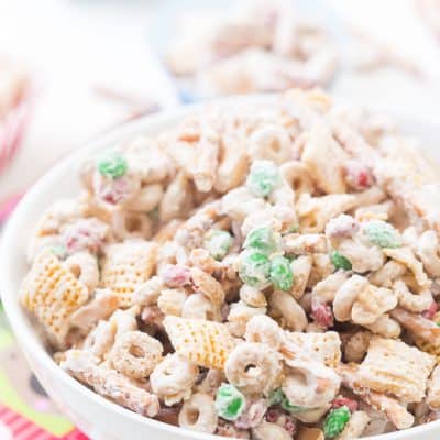 Christmas Crack Chex Mix is a family-favorite filled with Chex mix, cheerios, salted peanuts, M&M's, pretzels, and coated in chocolate! Beware because it's highly addictive and so good! Makes for delicious homemade gifts!