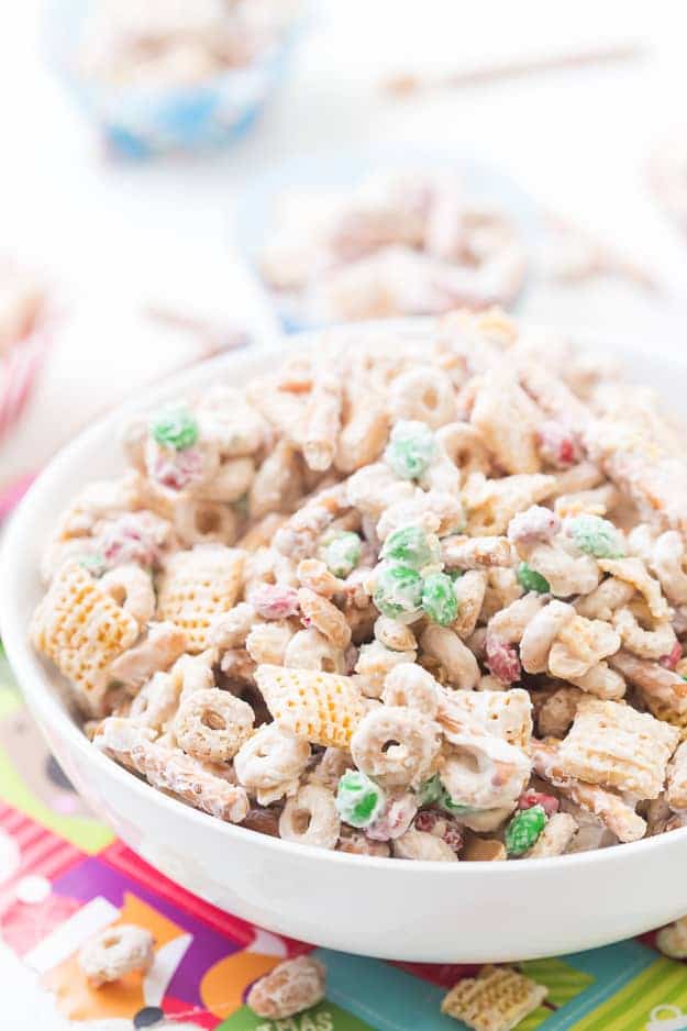 Christmas Crack Chex Mix is a family-favorite filled with Chex mix, cheerios, salted peanuts, M&M's, pretzels, and coated in chocolate! Beware because it's highly addictive and so good! Makes for delicious homemade gifts!