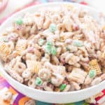 Christmas Crack Chex Mix is a family-favorite filled with Chex mix, cheerios, salted peanuts, M&M's, pretzels, and coated in chocolate! Beware because it's highly addictive and so good! Makes for delicious homemade gifts!