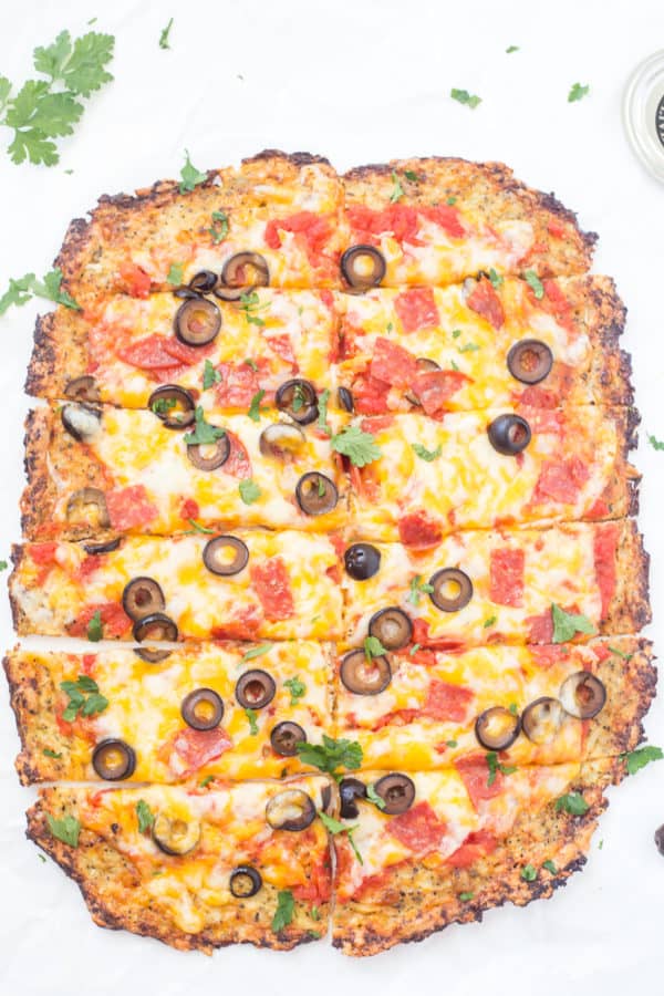 Low Carb Cauliflower Pizza Bites Low Carb Cauliflower Pizza Bites are hands-down the best pizza bites! Loaded with fresh vegetables, spices, and seasonings. Your taste buds will be in heaven and will not even notice a difference from traditional pizza. Paleo and Whole 30 compliant!