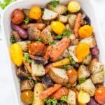 Easy Italian Roasted Vegetables are bursting with flavor from potatoes, carrots, tomatoes, and garlic. You will want to make these oven roasted vegetables with all of your meals! 